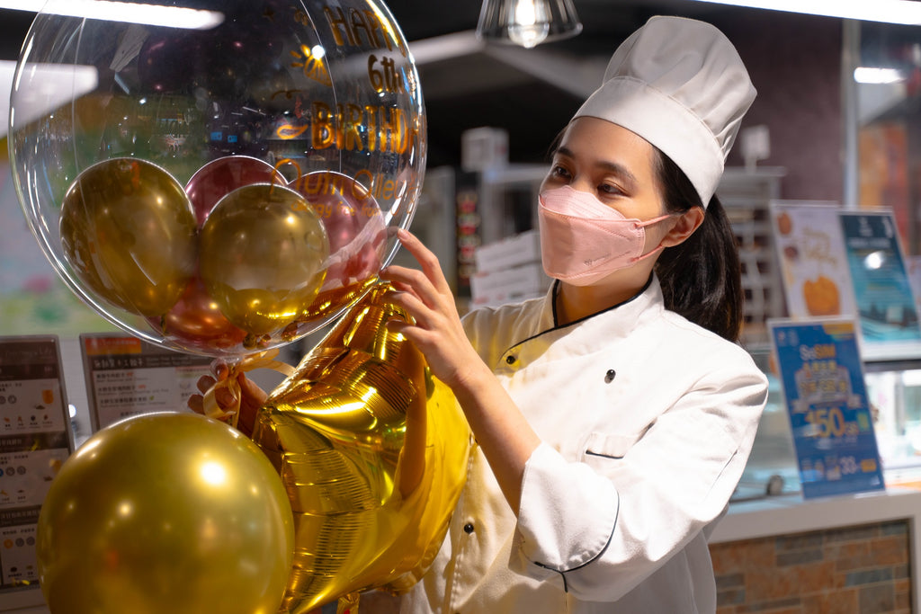 Bonnie as chef Nam Cheong Shop with balloon